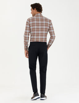 Темно-синие парусиновые брюки морковного кроя