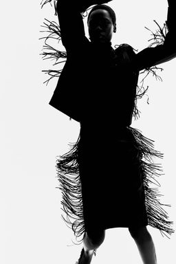 Falda revestida con flecos