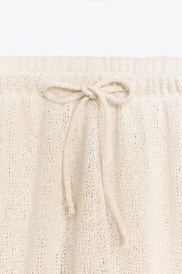 RUSTIC STRAIGHT-LEG TROUSERS