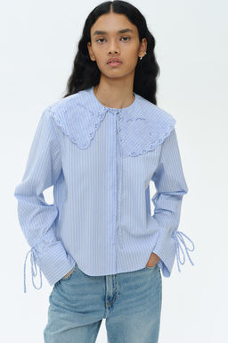 Blusa de popelina con bordado ingles