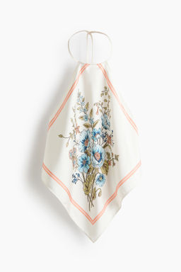 Top asim?trico de sat?n con escote halter