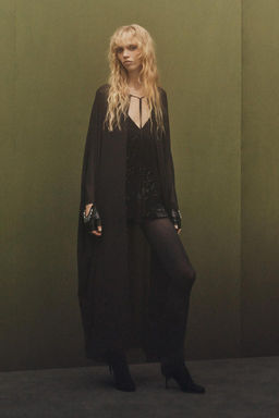 LONG TASSELLED CAPE X KATE MOSS