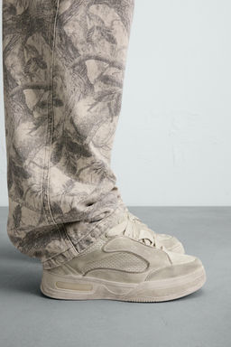 DISTRESSED CHUNKY TRAINERS
