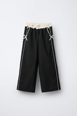 PANTAL?N NYLON FORRO POLAR LAZOS  / Negro