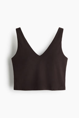 Top de deporte cropped con SoftMove