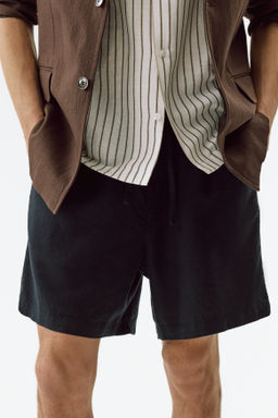 Pantal?n corto en mezcla de lino Relaxed Fit - H&m фото 11