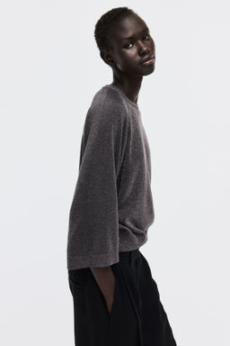 Top de punto fino con brillo - H&m фото 3