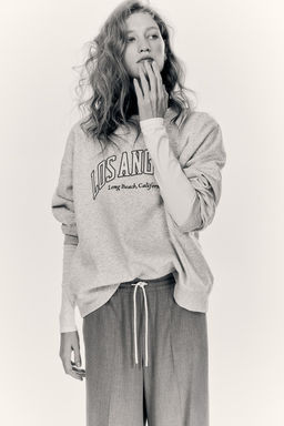 Sudadera con motivo de texto
