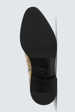 ANIMAL PRINT LEATHER BOOTS