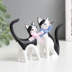 Набор фигурок полистоун «Кошки с бантиками», 2 шт., 9.3×7×3.7 см; 10×6.5×3 см