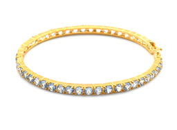 Браслет жесткий позолота, с цирконом голубым