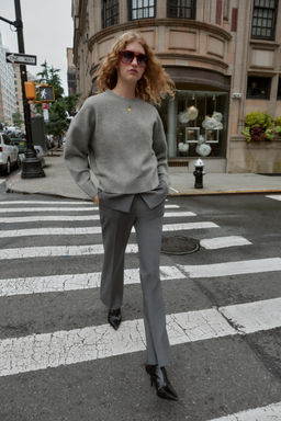 FLARE TROUSERS WITH VENTS