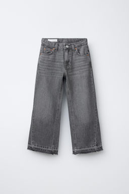JEANS FLARE DESFLECADO / Gris