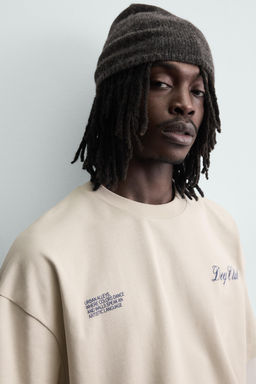 CAMISETA ESTAMPADO COMBINADO / Blanco roto