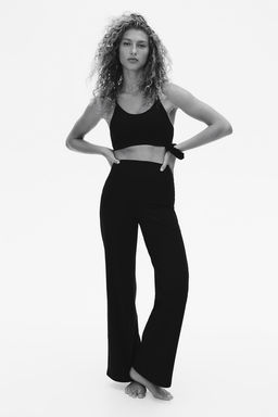 Pantalon de deporte acampanado en SoftMove - H&m фото 3