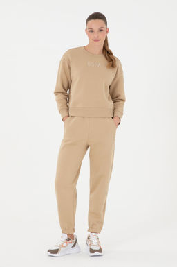 Женские спортивные штаны песочного цвета