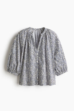 Blusa de popelina con mangas globo