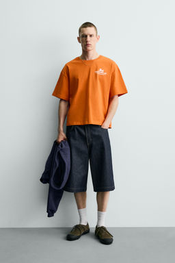 CAMISETA TEXTOS ESTAMPADOS CONTRASTE / Naranja