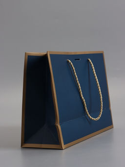 Пакет подарочный ламинированный, тёмно - синий с золотым, с бантом, 28×20×10 см