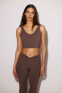 Leggings de yoga acampanados con SoftMove - H&m фото 4