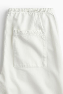 Pantal?n denim con cord?n de ajuste - H&m фото 9