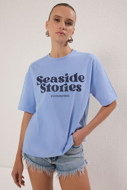 TRENDYOLMILLA Beyaz Bask?l? Premium %100 Pamuk Relaxed/Rahat Kesim Orme T-Shirt TWOSS24TS00178