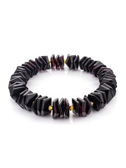 Яркий оригинальный браслет Шайба граненая из янтаря тёмно-вишнёвого цвета