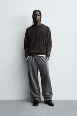 REVERSIBLE SWEATER WITH RIPPED EFFECT