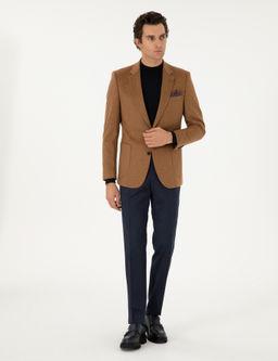 Тканевые брюки узкого кроя темно-синего цвета