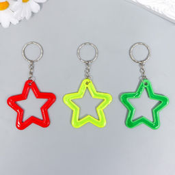 Цена за 12 шт. Брелок пластик светоотражающий "Звёздочка" МИКС 5,8х5,5 см