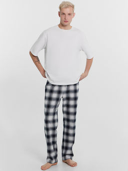 Брюки мужские в черно-белую клетку