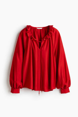Blusa con cuello de volante