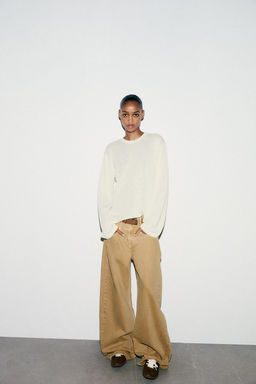 CUT-OUT KNIT TOP