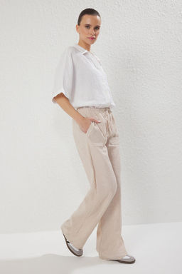 Trendyolmilla Tas Keten Gorunumlu Baglama Detayl? Wide Leg/Genis Paca Dokuma Pantolon TWOSS25PL00109 фото 2