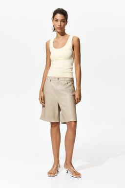 Top sin mangas en microfibra - H&m фото 10