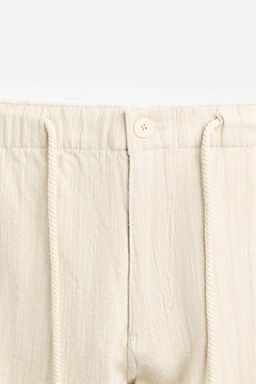 STRIPED TEXTURED TROUSERS - Zara фото 9