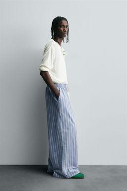 STRIPED OVERSIZE FIT TROUSERS