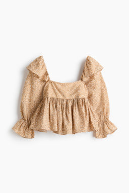 Blusa con volantes