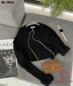 Пуловер вязаный в рубчик