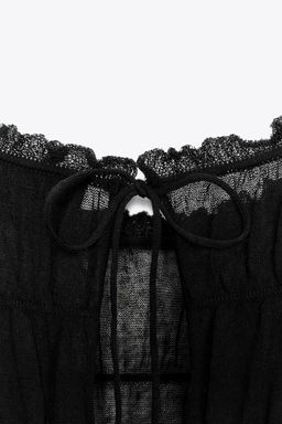 SEMI-SHEER KNIT BLOUSE WITH GATHERED DETAILS