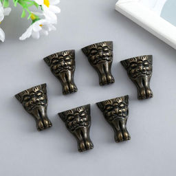 Цена за 6 шт. Уголок (ножка) для шкатулки металл Маска бронза 3,7х2,9 см