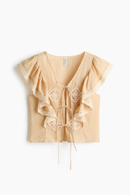Blusa con volantes de encaje
