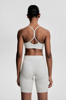 Sujetador de deporte en DryMove Light Support - H&m фото 4