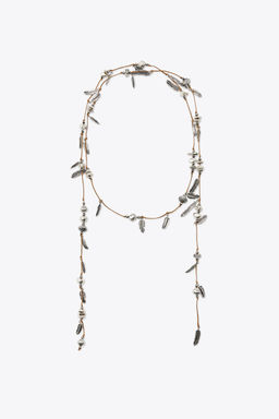 MULTI-POSITION CHARM CORD