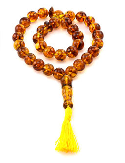 Чётки мусульманские на 33 бусины-шара из натурального формованного янтаря коньячного цвета