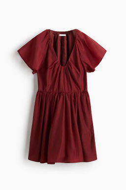 Vestido con mangas mariposa