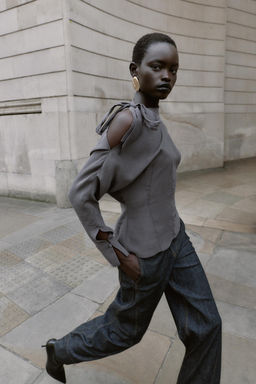 BLOUSE WITH SHOULDER OPENING AND BOW