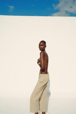 CHINO TROUSERS WITH TURN-UP HEMS