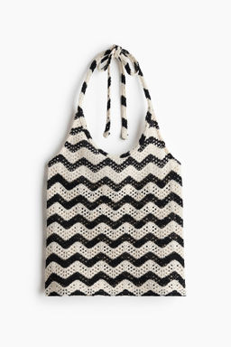 Top halter en punto pointelle