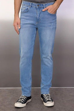A__k Mavi Esnek Kuma_ T_rnakl_ Destroylu Slim Fit Dar Kesim Jeans Kot Pantolon TMNSS21JE0067